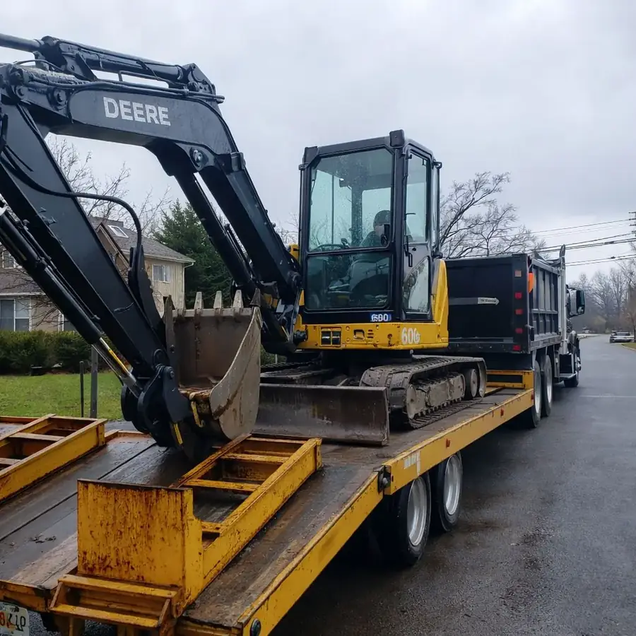 Excavator secured on a lowboy trailer